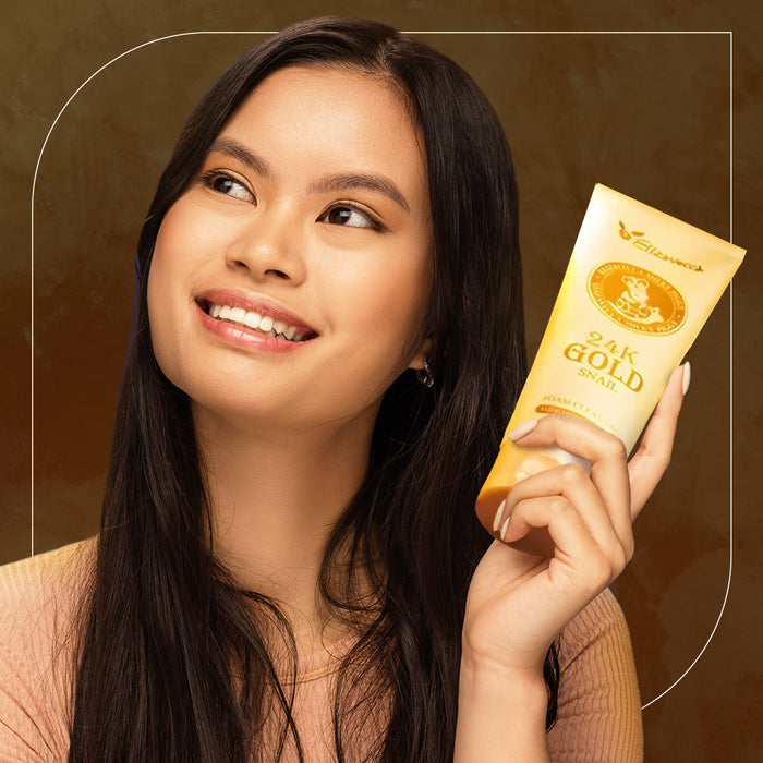 A woman holding a Milky Piggy 24K Gold Snail Foam Cleansing