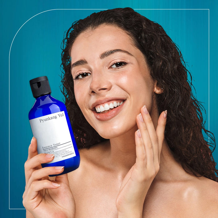 Woman Holding Pyunkang Yul Essence Toner