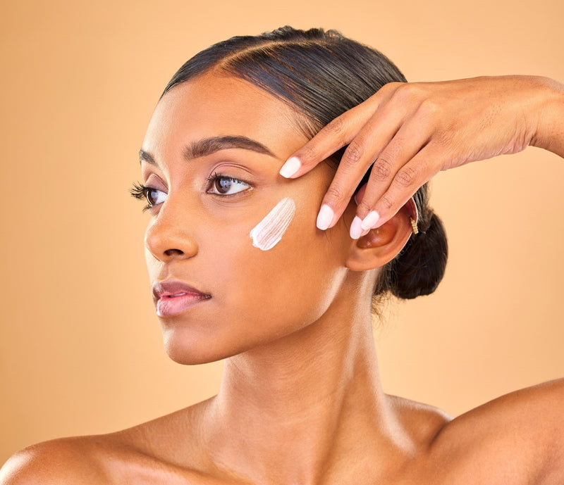 Woman With Face Cream on face